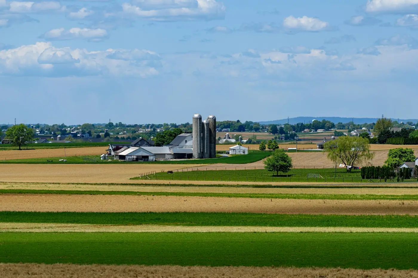 Farm fields and silos in the countryside, typical of rural York County, PA