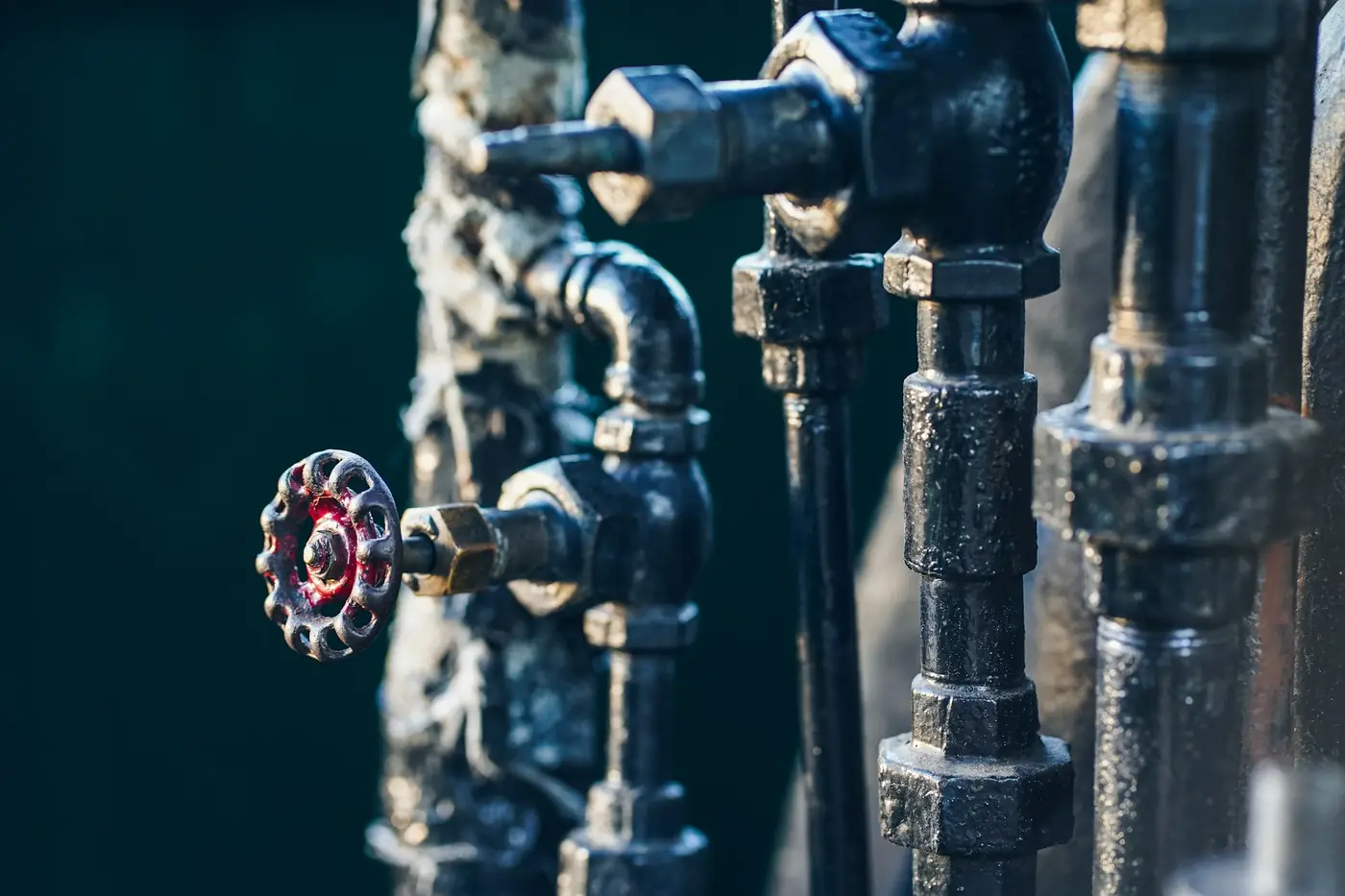 Water shut-off valves and pipes on a plumbing system